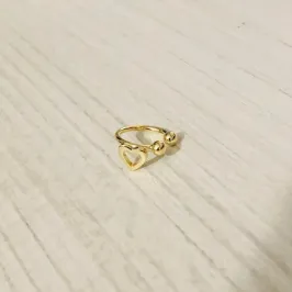 PIERCING FAKE CORAÇÃO VAZADO PEQUENO DOURADO