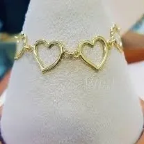 PULSEIRA FEMININA SETE CORAÇÕES ABS DOURADA 19 CM