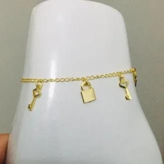 PULSEIRA INFANTIL CHAVE E CADEADO DOURADA