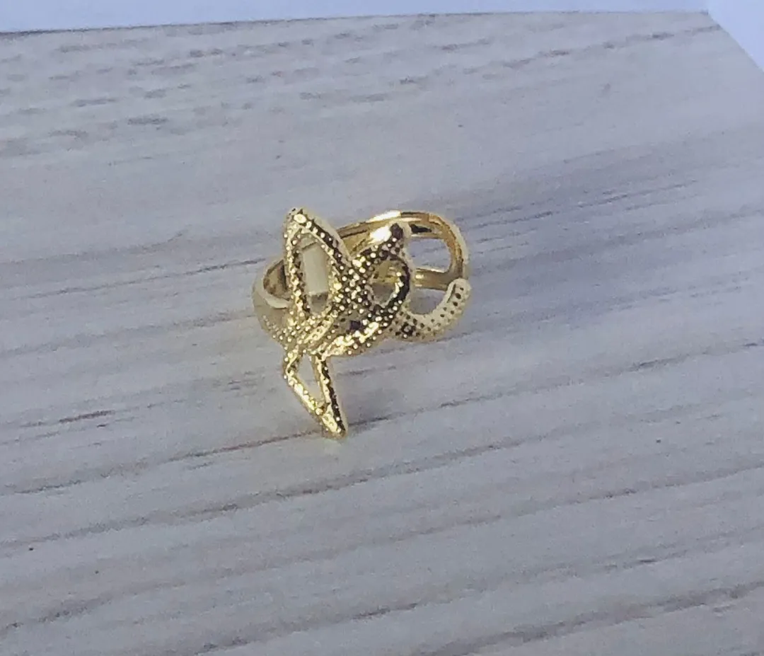PIERCING FAKE FÉ DOURADO